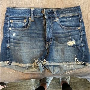 High rise Jean short-dark wash with rips
